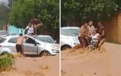 video-mostra-quando-mulher-e-resgatada-por-moradores-apos-ter-carro-levado-por-enxurrada